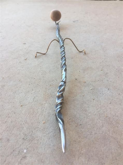 [OC] Need help/advice with a story behind this wand I made for a DM friend! Description in ...