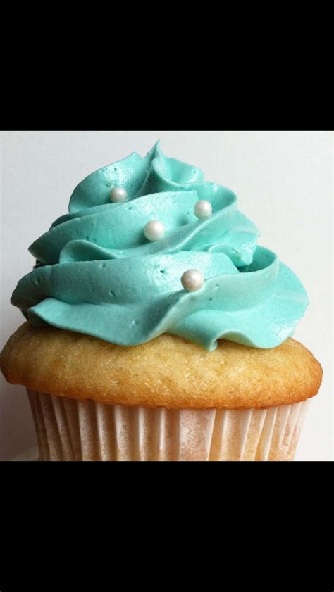 Blue icing cupcake | Amazing cakes, Cupcake icing, Yummy treats