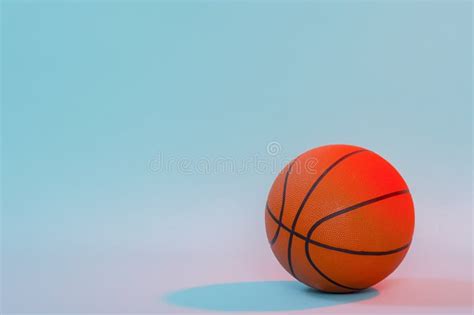 Basketball Ball Isolated on Blue Background. Blue Neon Banner Art Concept Stock Image - Image of ...