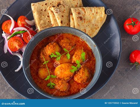 Indian Kashmiri Dum Aloo or Potato Curry and Roti Meal Stock Photo - Image of sauces, potato ...