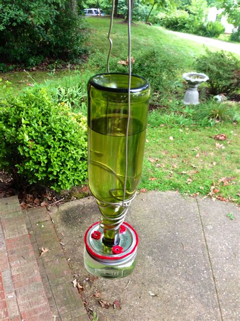 Finished DIY hummingbird feeder~ Wine bottle Small glass jar Red solo ...