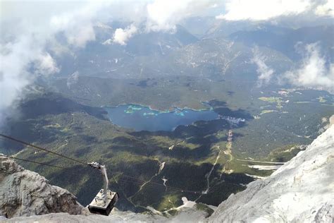 View from the top of Zugspitze (Germany's highest mountain) down to Eibsee : r/travel