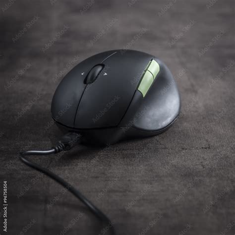 Black computer mouse Stock Photo | Adobe Stock