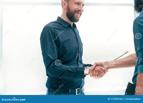 Smiling Business People Shaking Hands in the Office. Stock Photo ...