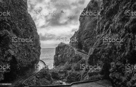 Dark Rainy Cliff And Coastal Highway In Madeira Spooky View Stock Photo - Download Image Now ...