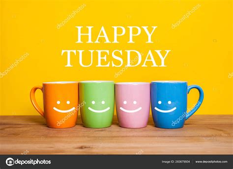 Happy tuesday word.cups of coffee and stand together Stock Photo by ©aradaphotography 283679504