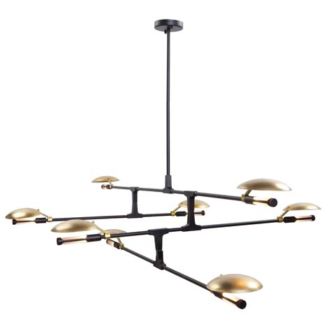 The Aventura Chandelier offers a sleek, modern look featuring a linear silhouette composed of a ...