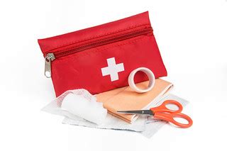 First Aid Kit | An image of a red First Aid Kit and scissors… | Flickr