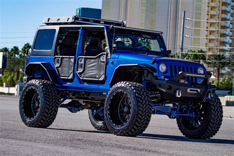 TIS Forged Wheels Adorining Electric Blue Wrangler — CARiD.com Gallery