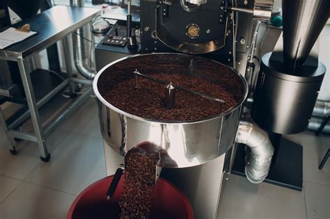 Premium Photo | Coffee roaster machine at coffee roasting process mixing coffee beans