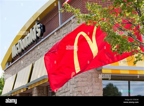 McDonalds flag on restaurant storefront - USA Stock Photo - Alamy