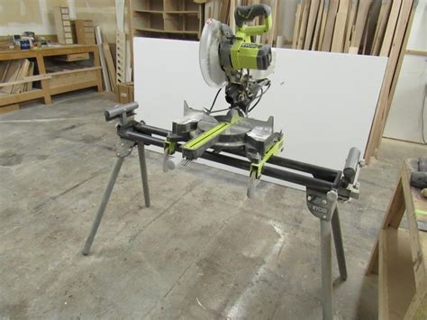 Ryobi compound miter saw w/ stand; 10" | Live and Online Auctions on HiBid.com