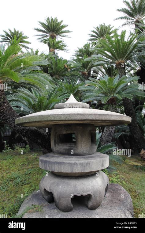 stone garden lantern Stock Photo - Alamy