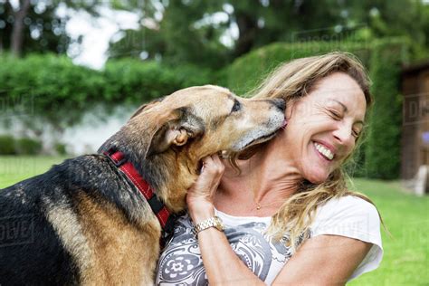 Senior Woman And Her Dog On A Scooter - HooDoo Wallpaper