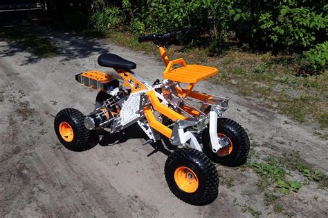 Tilting electric quad gets menacing off-road big brother