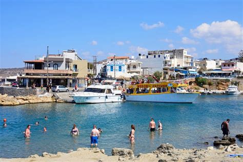 Sissi Harbour and Rocky Beach. Editorial Photo - Image of people, sunlit: 80250071