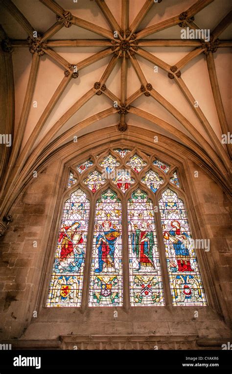 WELLS, UK - Stained glass windows of Wells Cathedral in Wells, Somerset, United Kingdom. Some of ...