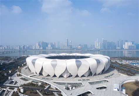NBBJ expresses sustainable hangzhou stadiums with lotus-petal elements