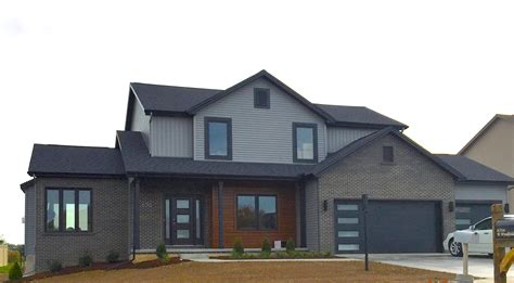 mastic-deep-granite-grey-siding-black-trim-cedar-siding-black-garage-door-certainteed-landmark ...