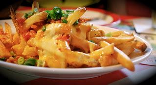 Cheese, bits of bacon and fries | A combination that is boun… | Flickr