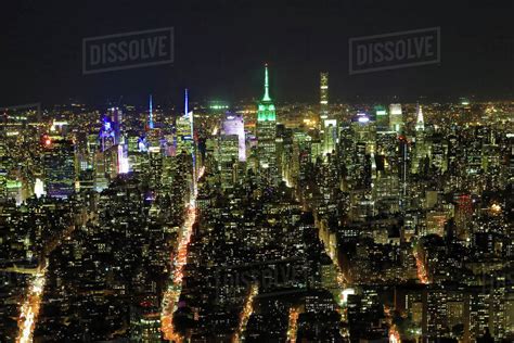 View of Midtown Manhattan at night - Stock Photo - Dissolve