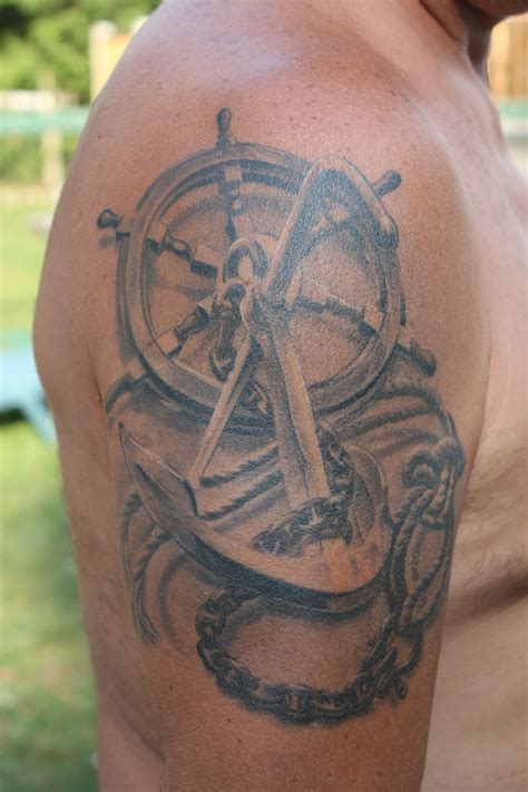 Anchor and Boat Wheel | Shoulder tattoo, Anchor tattoo men, Anchor tattoos