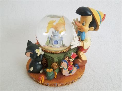 Rare Disney Pinocchio Snow Globe With Music Box That Plays - Etsy