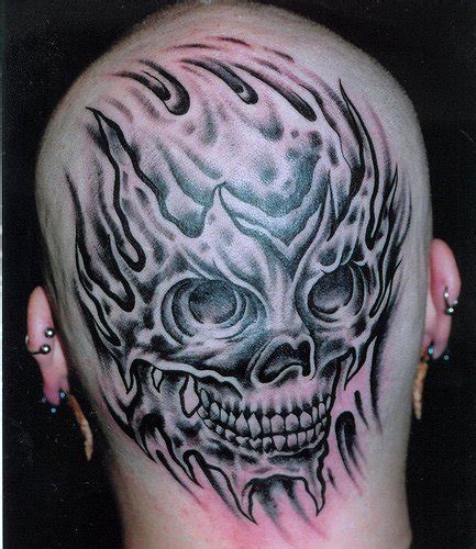 Bodypainting and Tattoos: Scary Pictures of Skull Tattoos