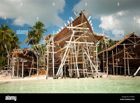 Traditional Pinisi wooden sailing boat construction, Bira Sulawesi Indonesia Stock Photo - Alamy