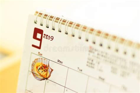 Happy New Year Concept:Desktop Calendar Sitting on Desk Showing Year of ...