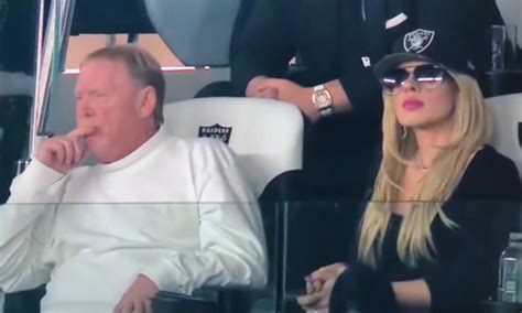 Mark Davis stirs buzz with blonde musician Orianthi at Raiders game