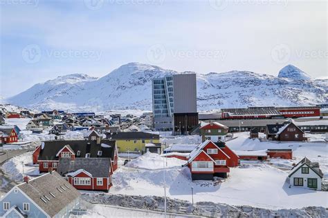 Nuuk city center streets with colorful Inuit houses covered in snow ...