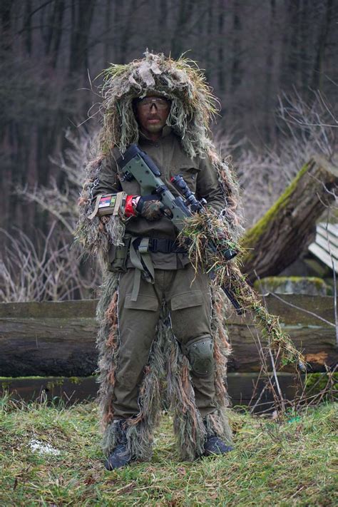 Sniper Soldier Covered With Grass Holding Sniper Rifle Military Image ...