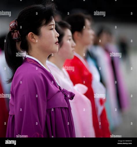 North Korean women paying respect to Kim il Sung in Mansudae Grand monument, Pyongan Province ...