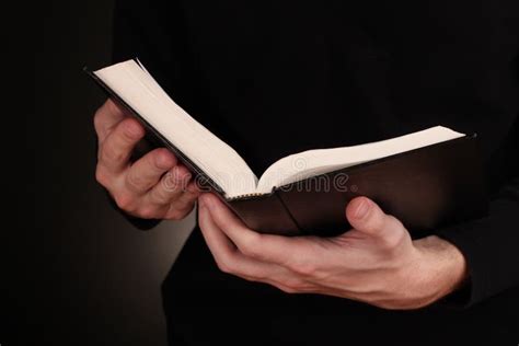 Hands holding open bible stock photo. Image of object - 23760436