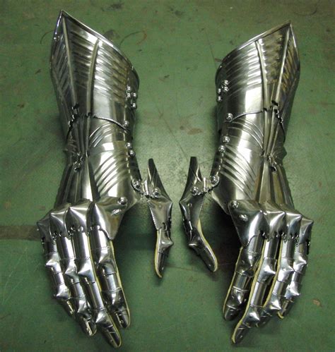 pair of late gothic gauntlets, ready for sewing in the gloves; Armor ...