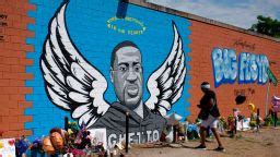 Houston mural honoring George Floyd is unveiled in front of his high school alma mater | CNN