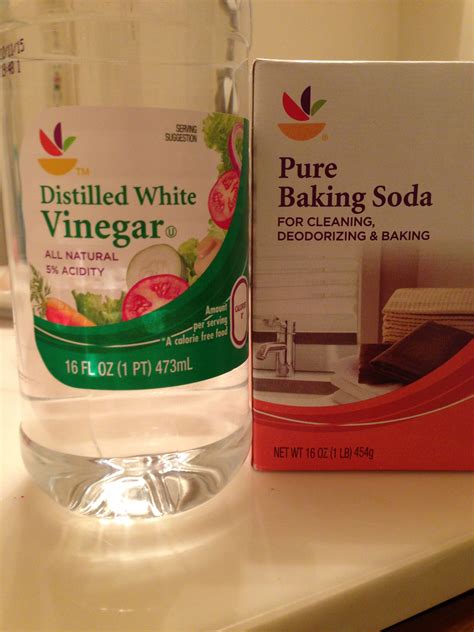 Baking soda and vinegar clear a clogged drain. Pour half the box of ...