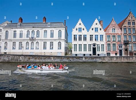 Boat tour in the canals of Bruges, Flanders, Belgium Stock Photo - Alamy