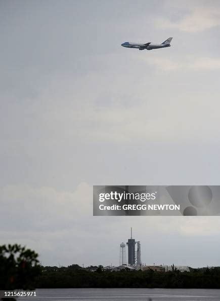 Air Force One with US President Donald Trump flies above launch pad ...