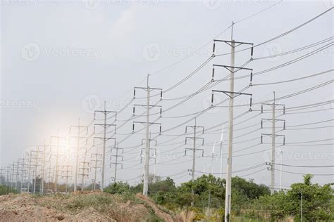 Power poles and power lines 14012368 Stock Photo at Vecteezy