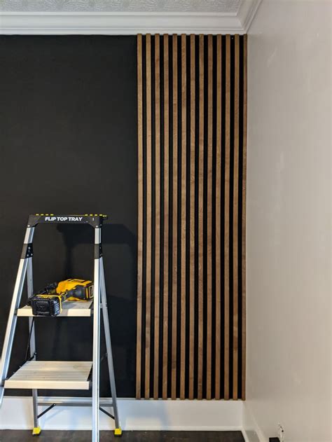 HOW TO MAKE AN AFFORDABLE WOOD SLAT WALL in 2021 | Wood slat wall, Modern wall paneling, Slat wall