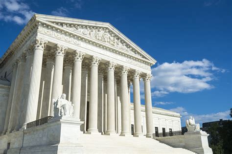 Supreme Court of the United States building front entrance with a scenic view of columns and ...