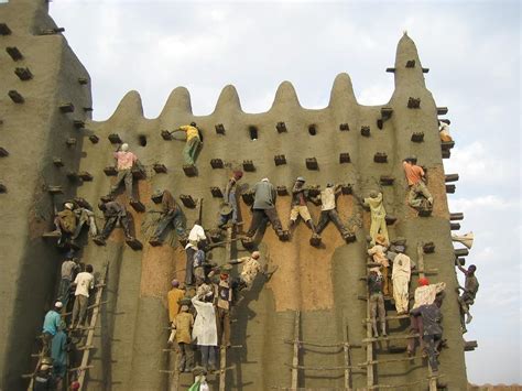 Great Mosque of Djenné, Mali. One of the largest mud buildings in the world. In order to pre ...