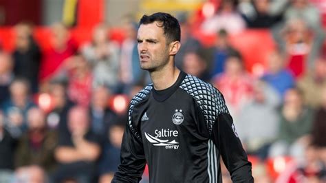 Goalkeeper Joe Lewis still believes Dons can close the gap on league ...