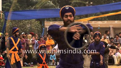 Nihang Sikh warriors display martial skills with weapons - YouTube