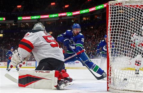 Devils' win streak vs. Canucks ends in ugly loss