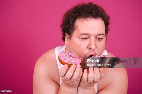 Funny Fat Man Eating Donuts On Vacation Stock Photo - Download Image ...