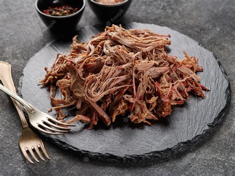 Premium Photo | Traditional barbecue pulled pork slow cooked pulled ...