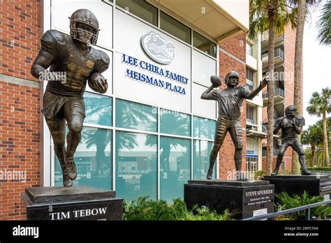 Bronze statues of University of Florida Heisman Trophy winners, Tim Tebow, Steve Spurrier, and ...